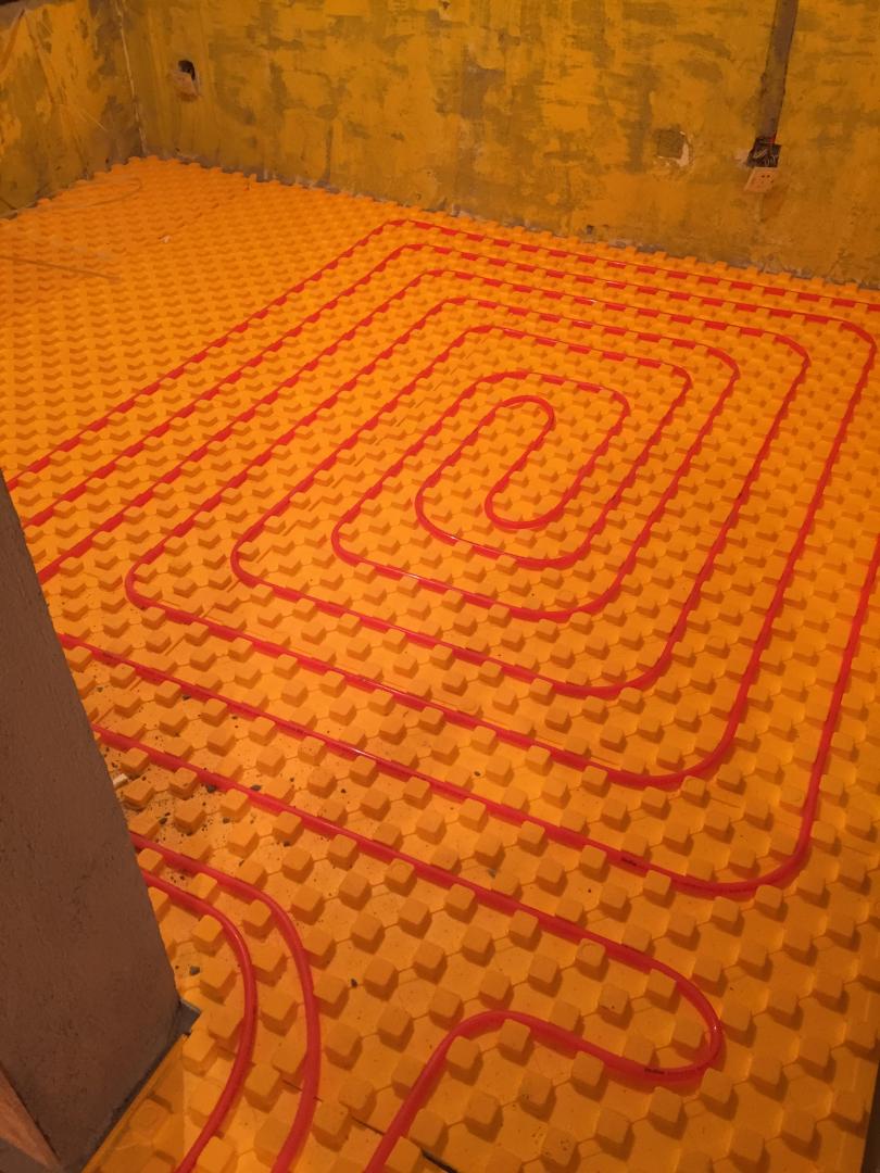 精装房地暖安装案例：成都麓山国际茵特拉肯蘑菇板地暖